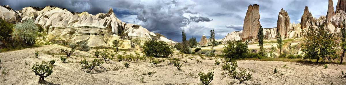 Vineyard country beneath the volcanic rock formations of Cappadocia