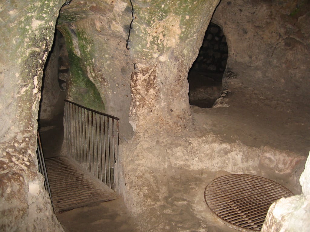 A carved passage between chambers in Kaymaklı underground city, Cappadocia